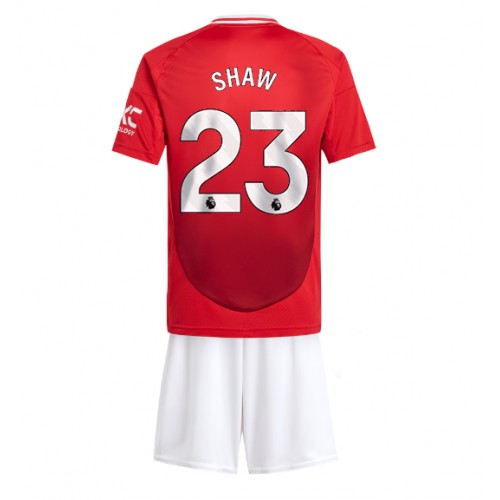 Fotballdrakt Barn Manchester United Luke Shaw #23 Hjemmedraktsett 2024-25 Kortermet (+ Korte bukser)